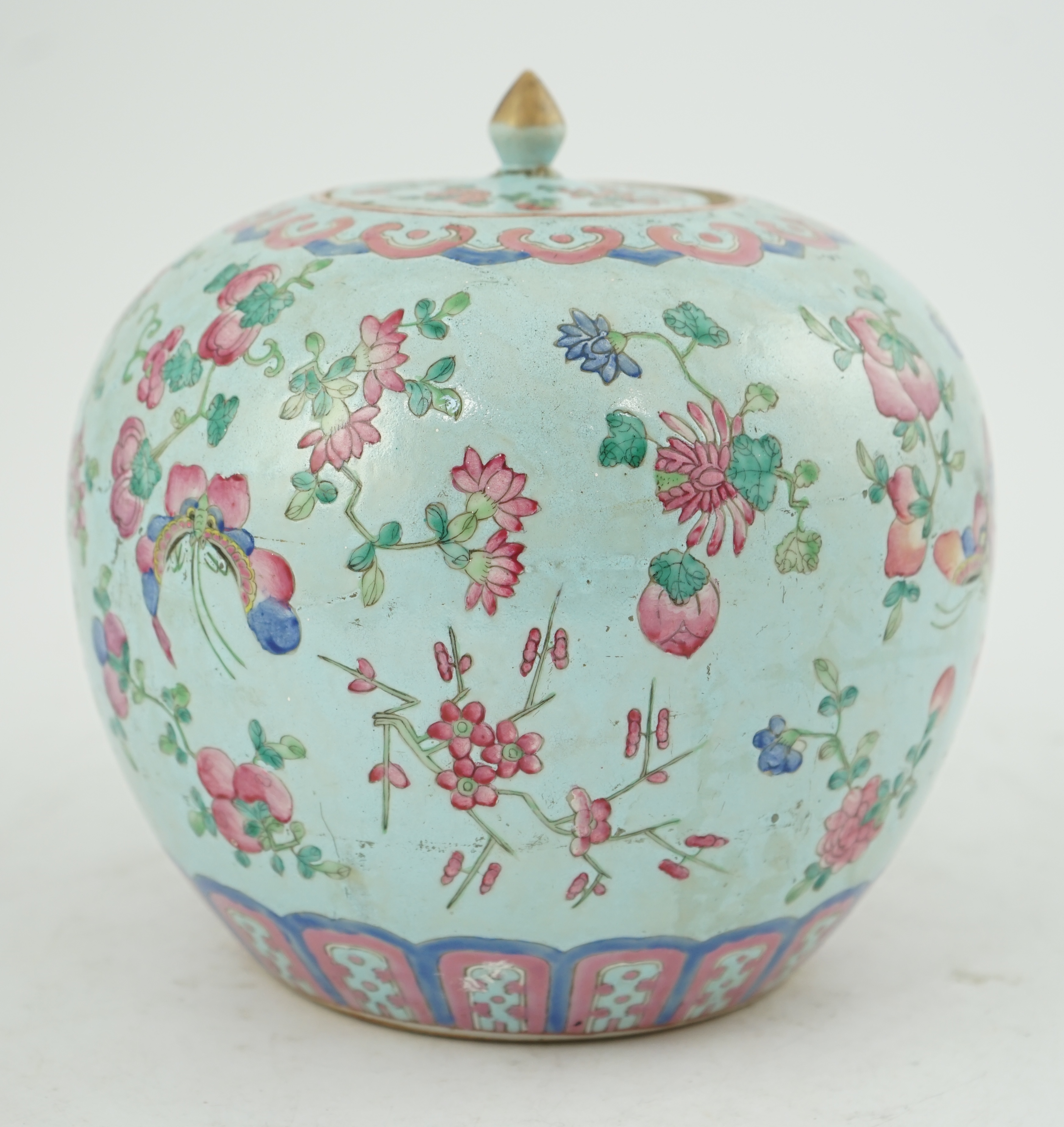 A Chinese turquoise ground famille rose jar and cover, late 19th century